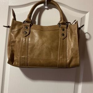 This is Melissa handbag distressed